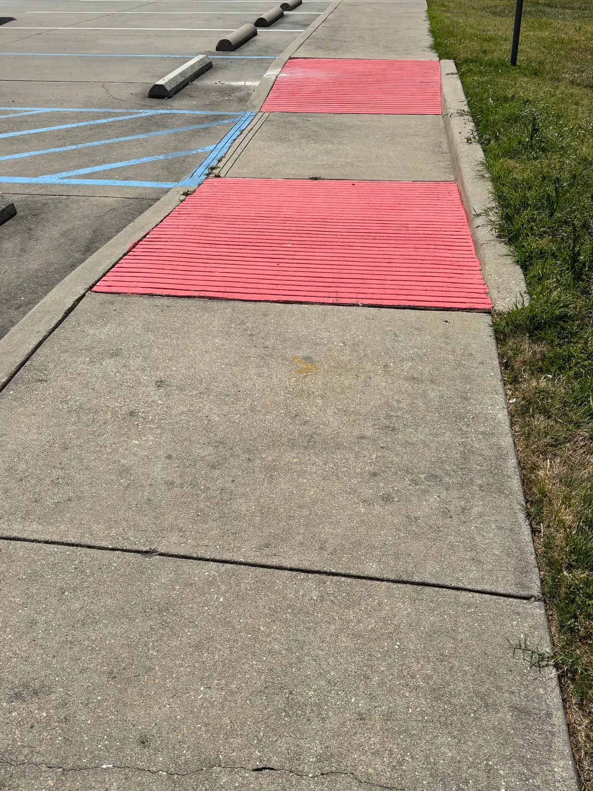 ADA ramp and sidewalk transition after leveling repair